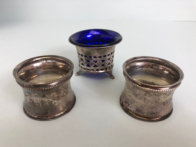 English hallmarked silver, two matching napkin rings with beaded edges and flower decoration and a