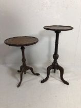 Antique style furniture, Two round mahogany side or occasional tables both on pedestal bases with