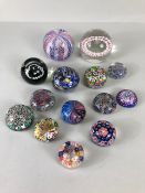 Decorative Glass, a collection of Glass paperweights of Murano and Caithness designs ranging in size
