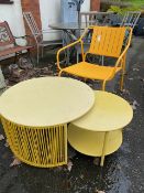 Contemporary circular metal garden nest of two tables and an orange metal garden chair