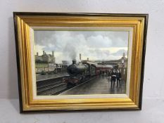 Railway interest, Gerald Broom painting on board of a steam train at Chipping Norton station