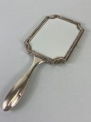 Hand held Silver coloured (white metal) double sided vanity mirror with bevelled edged glass and