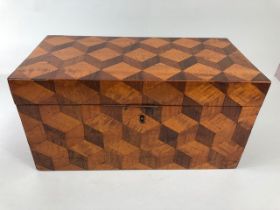 Antique tea caddy, early 19th century caddy box inlaid with a geometric design in exotic woods the