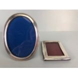 Two Hallmarked silver photo frames one square one Oval the largest approx 5.5cm tall