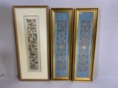 Three Framed oriental Silks, two on blue ground with flowers the largest depicting Chinese garden