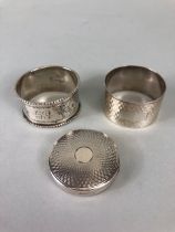 Silver hallmarked lined compact and two hallmarked silver napkin rings (total weight approx60g)