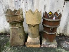 Three ornamental chimney pots