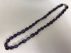 Necklace of Amethyst pebble style stones approx 44cm in length