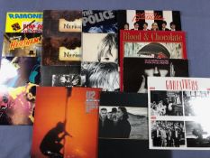 15 Punk/New Wave LPs/12" including: The Ramones, Sham 69, Stiff Little Fingers, Fields of