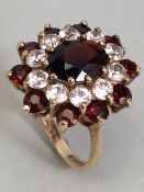 9ct Yellow Gold large cluster ring set with white brilliant cut stones and garnets size approx 'N'