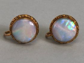 Pair of vintage 9ct Gold earrings each set with round slight cabochon cut Opals each approx 10.3mm