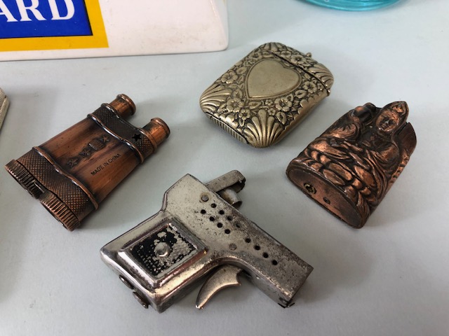 Vintage smoking memorabilia to include, advertising ashtrays, vesta case, novelty lighters, - Image 2 of 5