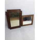 Vintage mirrors, two Mid 20th Century oak framed mirrors with raised decoration, one approximately