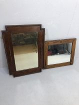 Vintage mirrors, two Mid 20th Century oak framed mirrors with raised decoration, one approximately