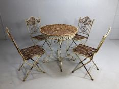 French style bistro table and four folding chairs, with latticework design and moulded finials,