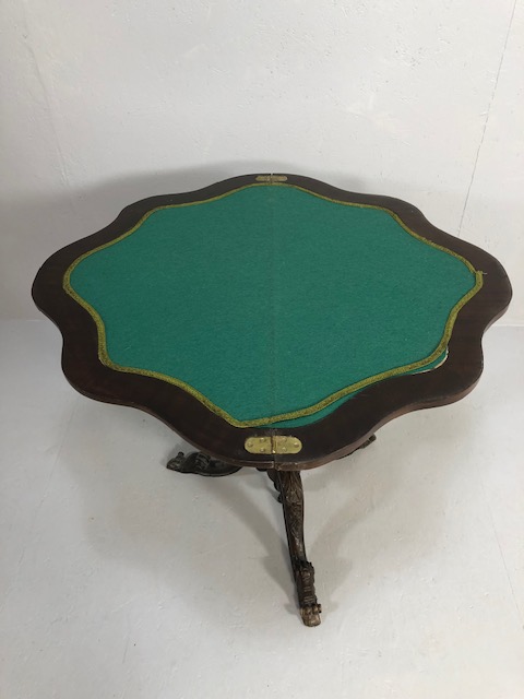 Antique folding card table with book match veneer, on carved tripod base opening to reveal green - Image 5 of 7