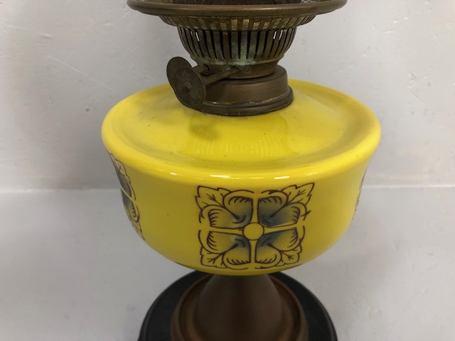 Antique 19th century brass oil lamp, modernist yellow reservoir with frosted glass shade on a - Image 2 of 5