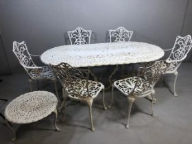 Large White painted metal Garden Table of pierced openwork design with ornate plinths below approx