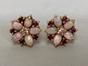 9ct Yellow Gold flower cluster earrings set with opal and ruby petals and a central Diamond approx