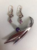 Silver & Amethyst Set Brooch and earrings by Ellis Kauppi of Finland, the brooch of sweeping leaf