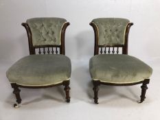 Pair of low button back, upholstered, wooden framed nursing chairs