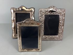 Silver Frames, three vintage English hall marked photograph frames, one with embossed decoration