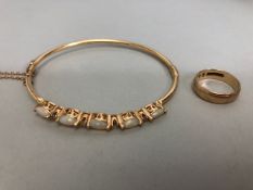 9ct Gold band approx size 'I' and 2.6g with a bangle (as found diamond missing) set with Opals
