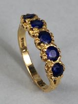 18ct Gold ring set with five Blue Sapphire Gemstones size approx 'K'