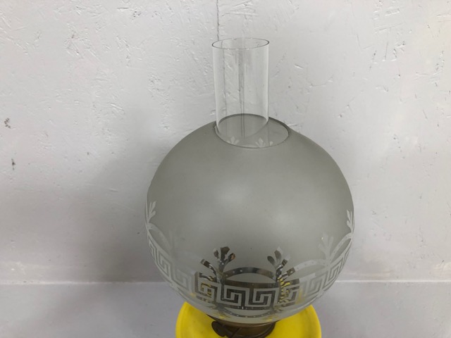 Antique 19th century brass oil lamp, modernist yellow reservoir with frosted glass shade on a - Image 4 of 5