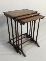 Early 20th Century nest of three tables on on fine turned legs, approx 70cm tall