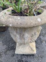 Two concrete garden urns approx 53cm tall