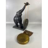 Oriental Carved wooden Elephant with out stretched trunk holding a gong, approximately 50cm high (
