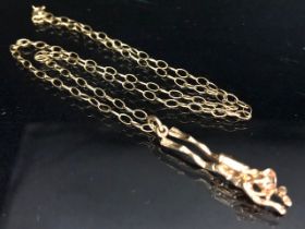 9ct Gold chain with interesting 9ct Gold hallmarked pendant in the form of a Suba Diver, chain