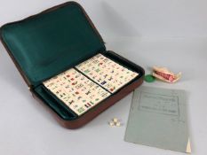 Vintage Chinese Mah-jongg or 4 winds game set the tiles of bone and bamboo along with rule book