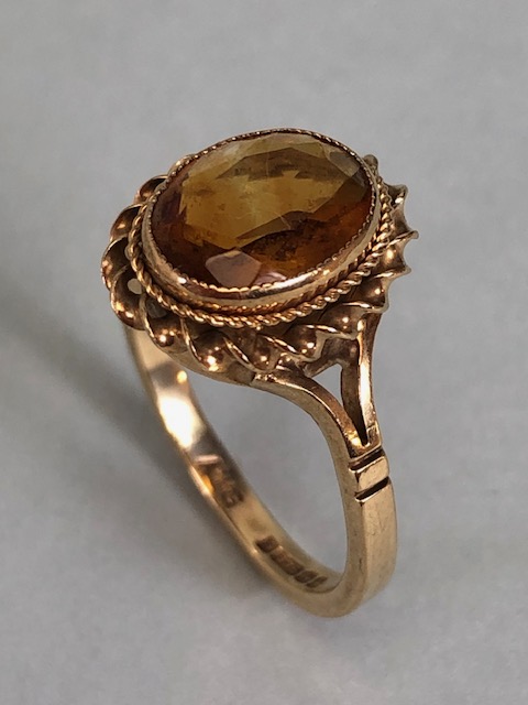 9ct Gold ring set with a faceted Citrine gemstone size 'G'