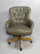 Grey leather swivel office / captains chair, on castors