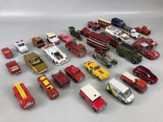 Die cast cars, a quantity of play worn cars and trucks to include examples from Dinky, Corgi and