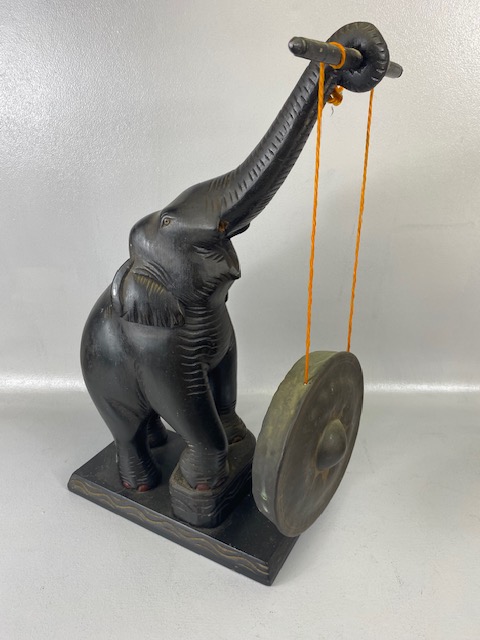 Oriental Carved wooden Elephant with out stretched trunk holding a gong, approximately 50cm high ( - Image 3 of 6