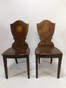 Pair of Edwardian shield back hall chairs, on tapering legs with inlay detailing (A/F)