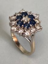 18ct gold flower cluster ring set with Diamonds and Sapphires (six sapphires, thirteen diamonds)