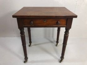 19th Century drawing room occasional table with turned legs on brass casters and single drawer,