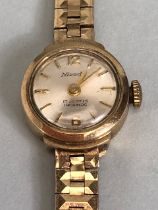 9ct Gold watch by Nivada with gold 9ct strap, 17 Jewels Incabloc movement total weight 15.9g