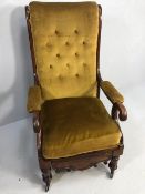 Antique Furniture, Edwardian mahogany lounge armchair on brass castors the padded seat and back with