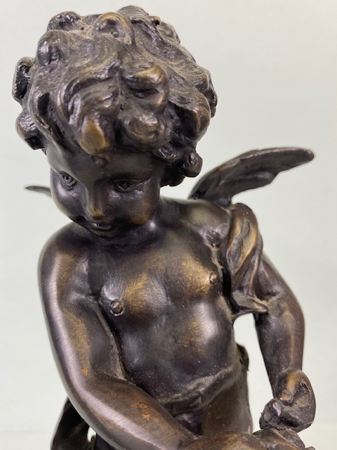 Bronze Figures, two 19th century style patinated bronze statues on marble bases of Putti playing - Image 7 of 14