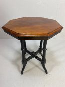 Early 20th Century octagonal mahogany occasional table with ebonised legs approximately 48 x 64cm