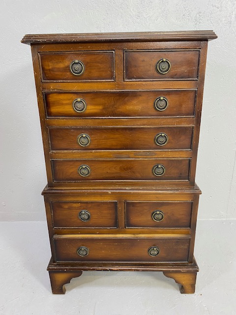 Modern nine drawer chest of drawers in a smaller size approx 82cm tall