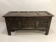 17th / 18th Century oak coffer four panel design with carved three panel front of serpents approx