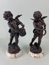 Bronze Figures, two 19th century style patinated bronze statues on marble bases of Putti playing