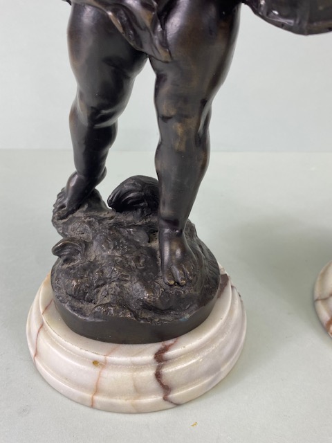 Bronze Figures, two 19th century style patinated bronze statues on marble bases of Putti playing - Image 4 of 14