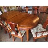 Modern Chinese hardwood extendable table and chairs (two carvers) with matching Alter style